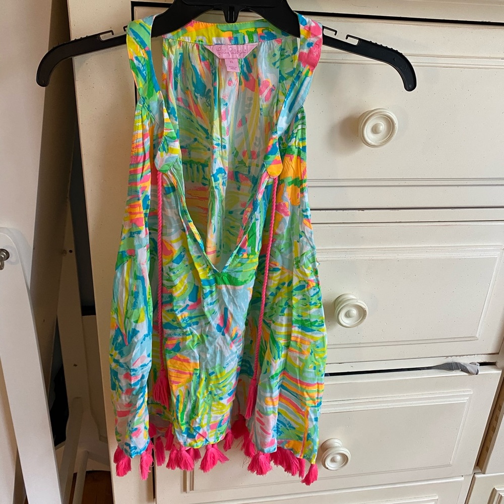 Never worn tassel top